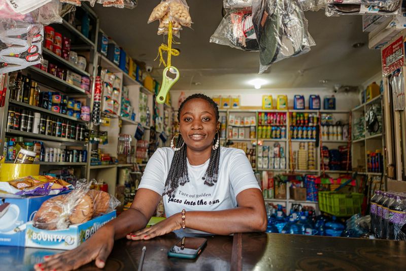 Shopkeeper in her store