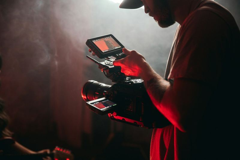 Videographer with his camera